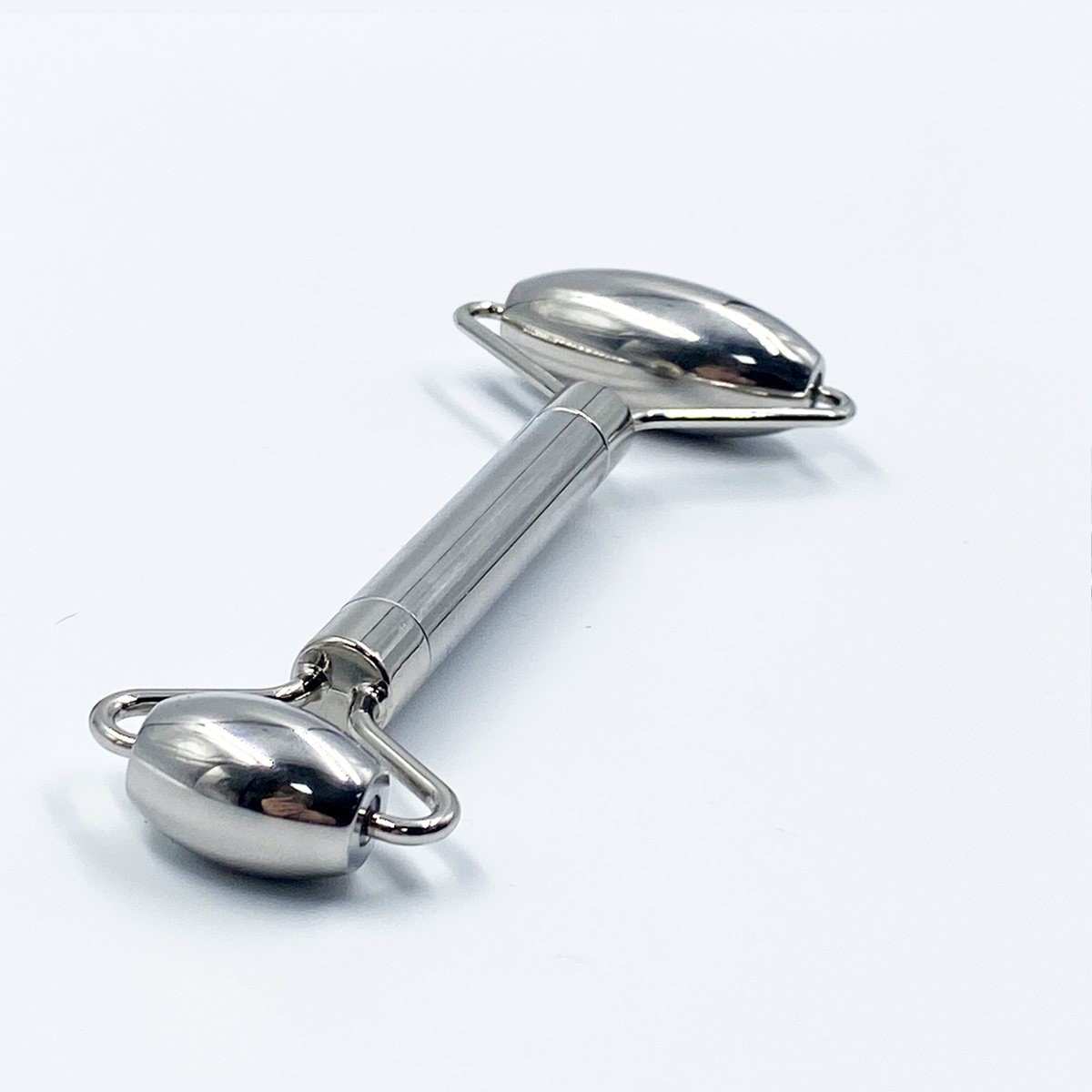 Stainless Steel Dual-Head Facial Roller In use