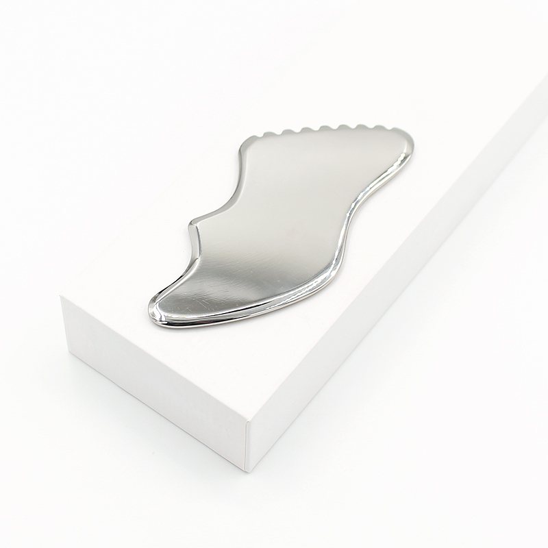Wave-Edge Stainless Steel Gua Sha Board In use